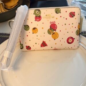 Coach White Wristlet with Colorful Fruit Design